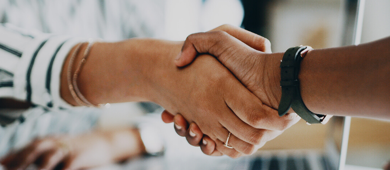 Professional reviewing equity compensation and stock-based benefits as part of financial planning