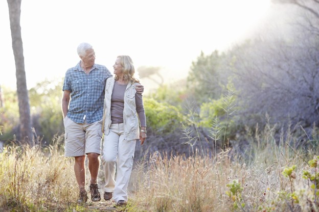 Couple discussing retirement planning for couples with a financial advisor